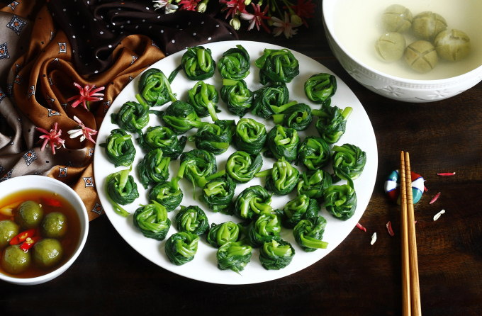 Rau muống chứa nhiều nitrat, không nên hâm lại bằng lò vi sóng. Ảnh: Bùi Thủy